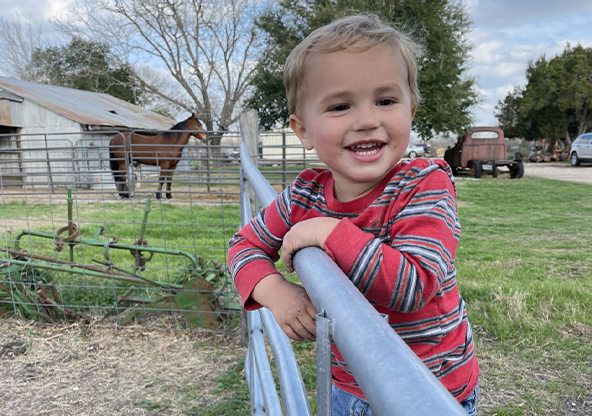 Lane helping at the ranch