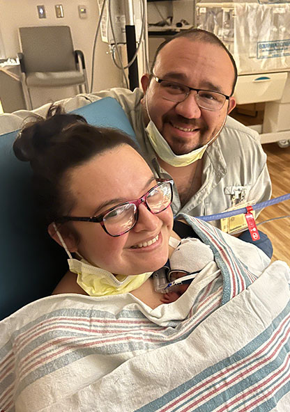 Lillian, her husband and Lucia after delivery