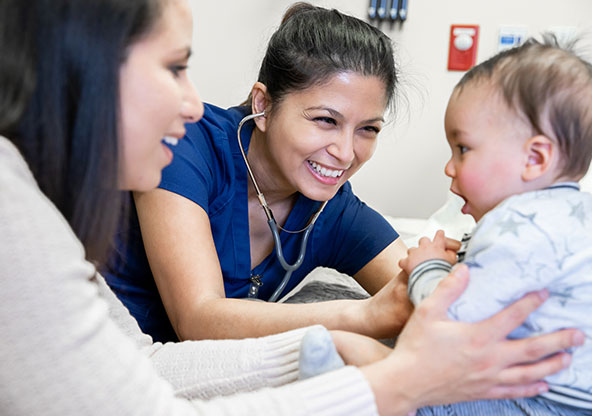 Nurse attending to baby with RSV 