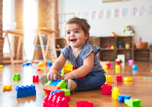 A toddler playing with toys